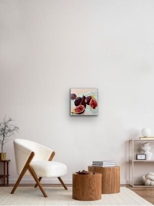 Figs on a black and white striped table cloth