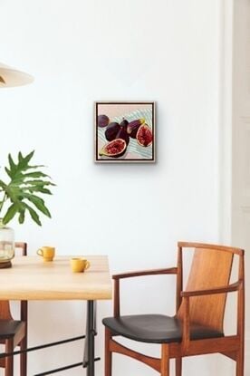 Figs on a black and white striped table cloth