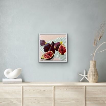 Figs on a black and white striped table cloth