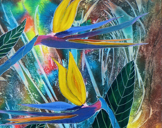 on a multicoloured background of blues, greens, yellows and browns with streaks of pastel colours are a couple of orange yellow blooming wings of the bird of paradise flower with blue stems and dark green leaves