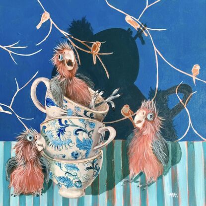 Baby galahs laughing with patterned teacups