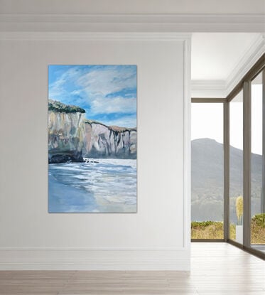 Seascape with beach and tall cliffs.