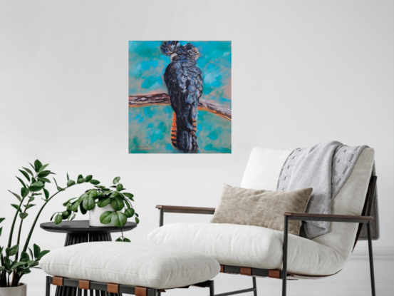 this artwork depicts the beauty of an Australian native bird of the Cacatuidae family, our stunning  female black cockatoo sitting on a branch with a come hither look in her eyes against a background of aqua.