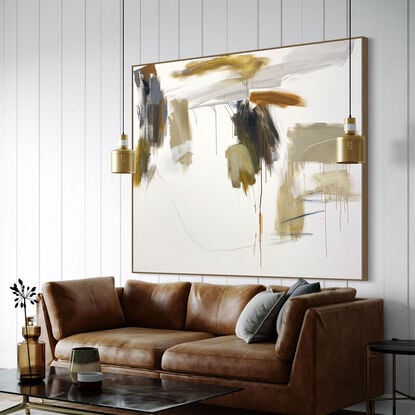 bold paint and pencil marks in light ochre with areas of white and grey, beige, tan, and navy blue expressive marks across a large canvas