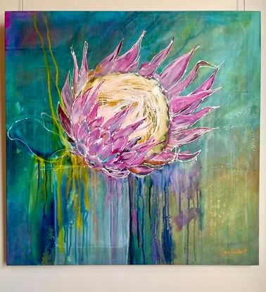 A large, single king protea bloom in bold pink colours on a blue/ green background with textural drips and layers of other colours of ochre and hot pink peeking through in small areas. 