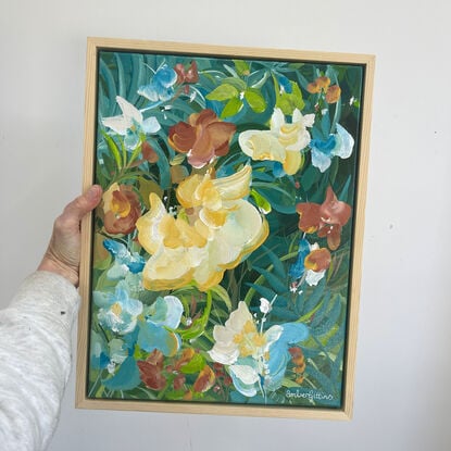 small colourful tropical flower painting framed in a natural frame