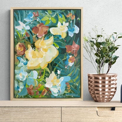 small colourful tropical flower painting framed in a natural frame