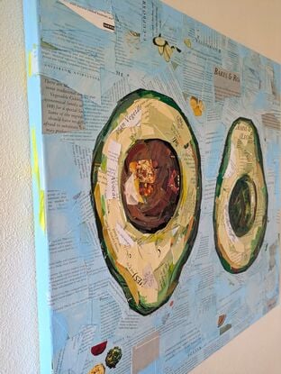 Collaged mixed media painting of an avocado cut in half