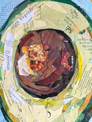 Collaged mixed media painting of an avocado cut in half