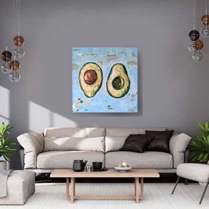 Collaged mixed media painting of an avocado cut in half