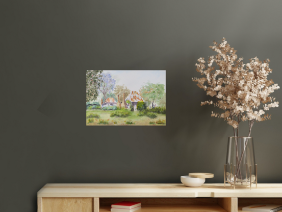 a misty spring day in the old mining village of Hill End with an old miners cottage with rusty roofs and chimney stacks surrounded by natural shrubs, grasses and trees with a hint of blooming jacaranda trees