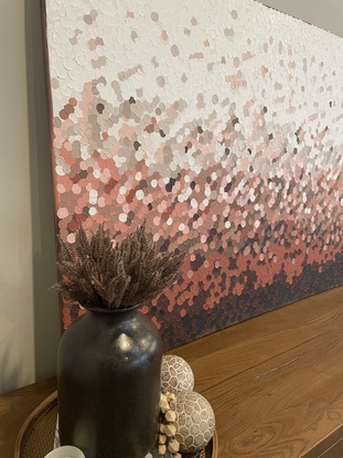 Inspired from colours from Uluru australia, this painting is done with textured dots in rust, brown, peach and white tones