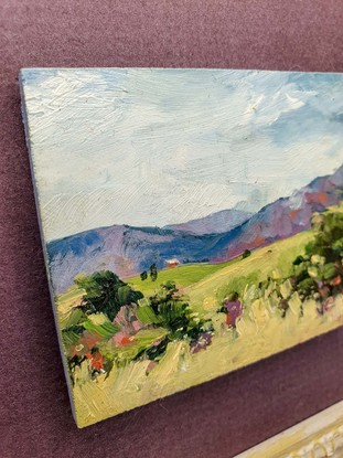 Miniature landscape of green hills with tiny cottage and Blue Mountains, oil on mini tile by Victoria Collins