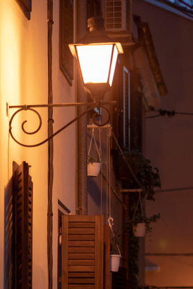 Old European cobblestone street at night