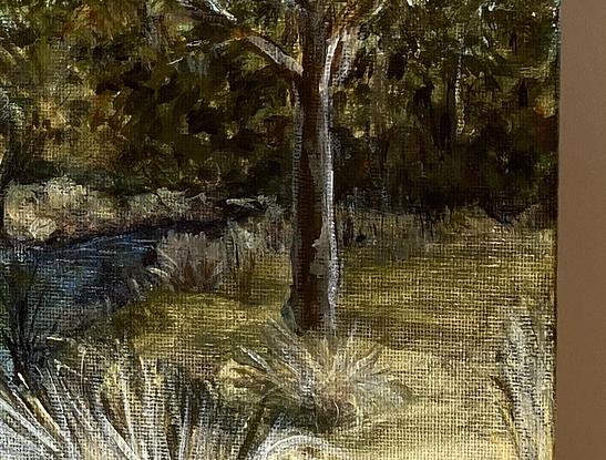 An impressionistic view of the trees, grasses and water  of the Thredbo River. 