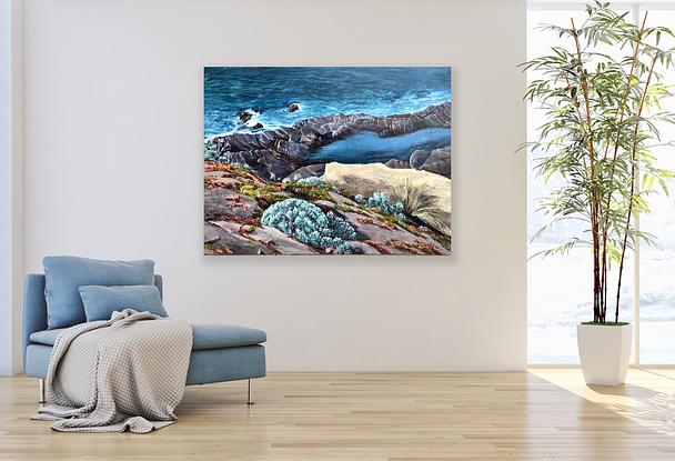 Ocean with natural rock pool and colourful plantlife