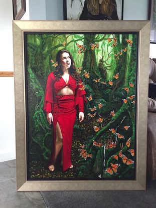 young woman in rainforest and butterflies 