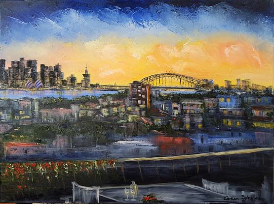 Panoramic view of the sunset falling on Sydney from a balcony. Lots of illuminated buildings in the middle ground. Sydney skyline, with the Harbour Bridge, in the background. Yellow, orange and blue on the sky. 