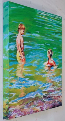 Two tanned children cooling off in the greeny blue swirling water of Cinque Terre Italy.