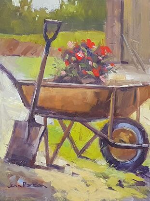 Simple garden scene with a wheelbarrow and flowers 