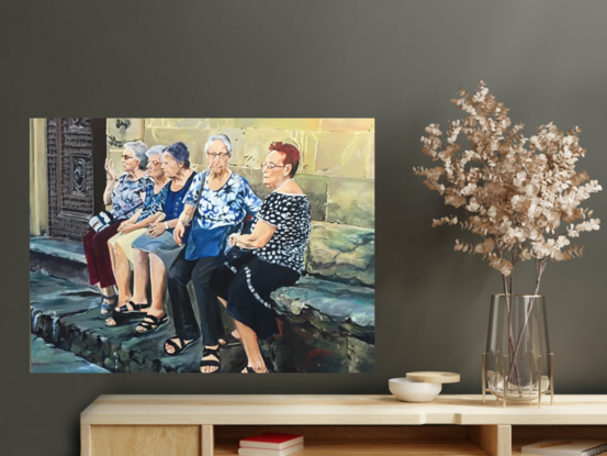 Five Italian  nonnas sitting  on a stone bench near Santo Spirito in Oltrano, Florence, Italy. 